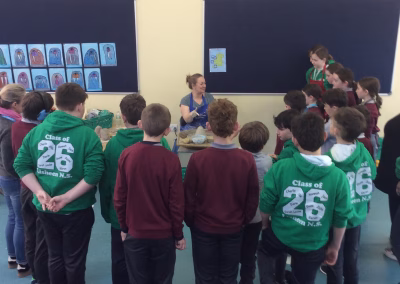 children learning how to do pottery